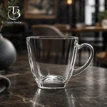 فنجان شیشه ای از جنس بلور مدل KTZB47 از برند بلینک مکس روی میز